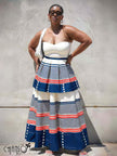 Cream bandeau top and striped tiered maxi skirt with blue and red bands