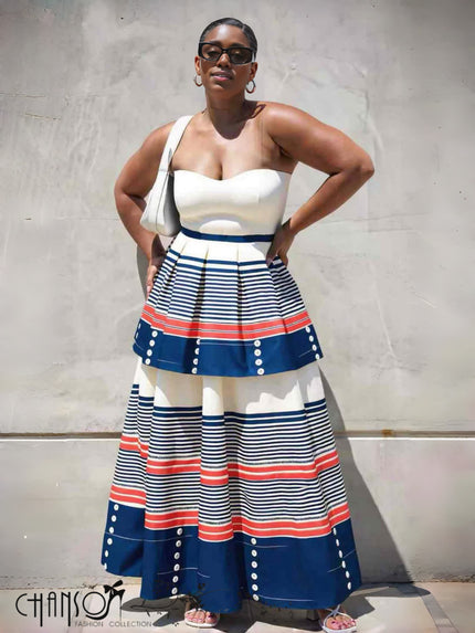 Cream bandeau top and striped tiered maxi skirt with blue and red bands