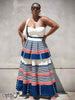 Cream bandeau top and striped tiered maxi skirt with blue and red bands