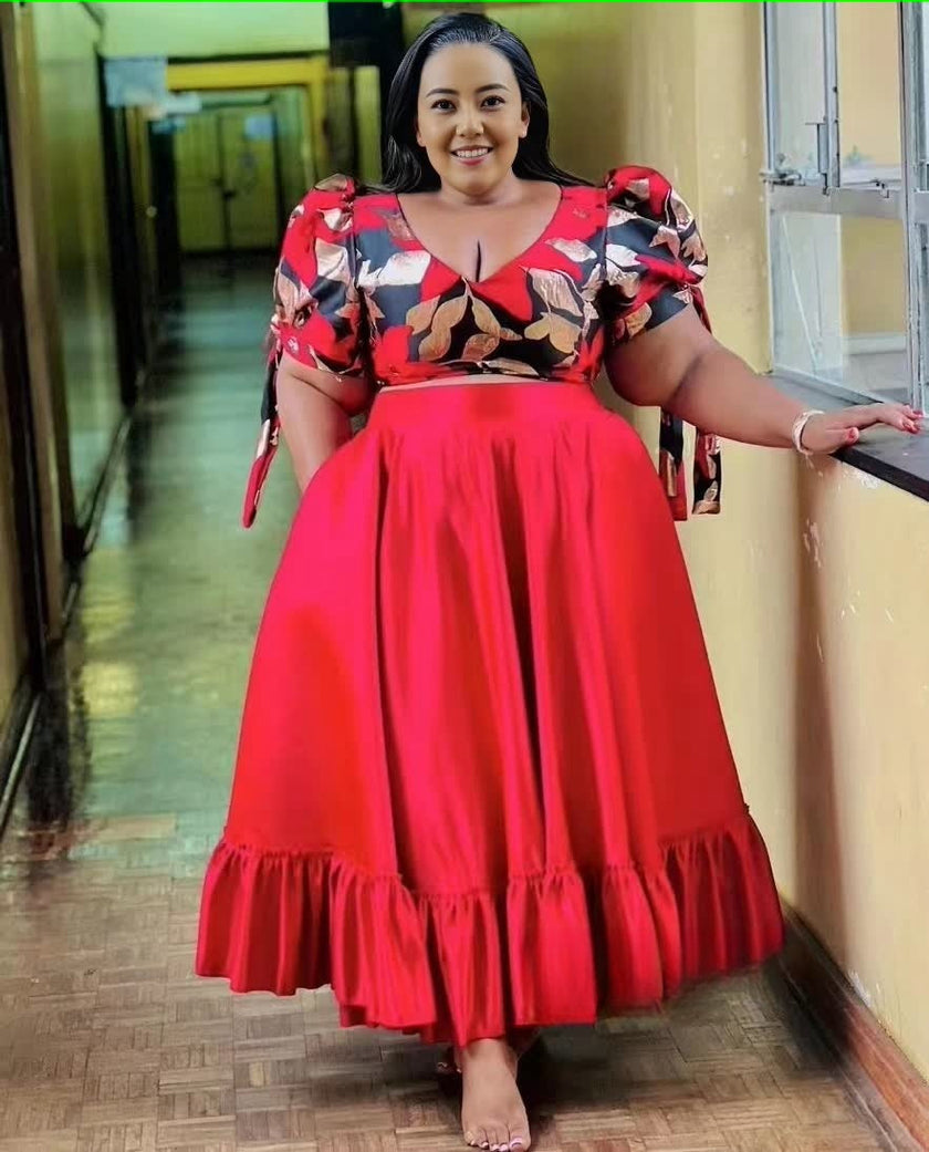 Floral puff-sleeve twin set with pleated skirt, red floral bodice and red skirt