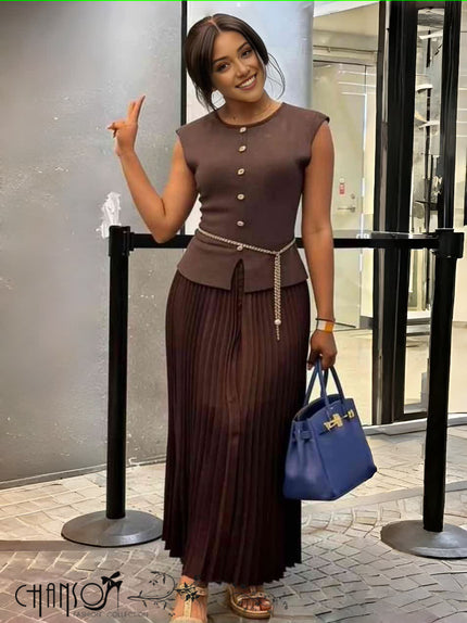 Brown pleated knit midi dress with button detail, peplum waist and belt tassel