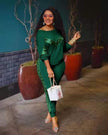 Dark green women’s lounge set with lace accents, long-sleeve top and joggers
