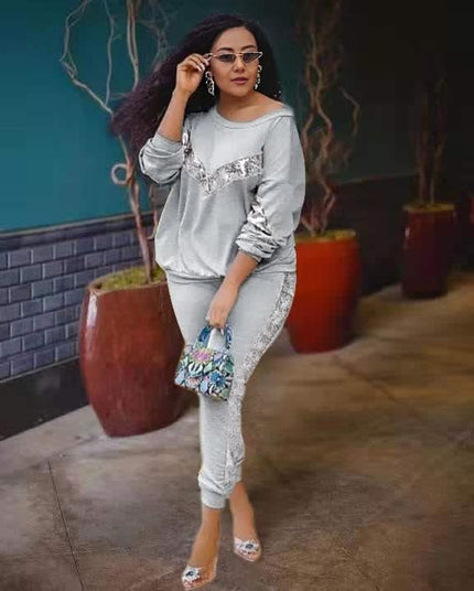 Lounge set assorti, haut à manches 3/4 et pantalon, décor argenté gris clair
