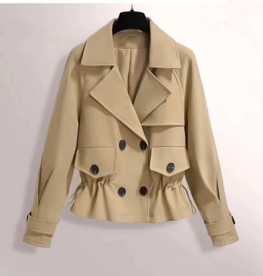 Light beige cropped double-breasted jacket with notched lapels and flap pockets