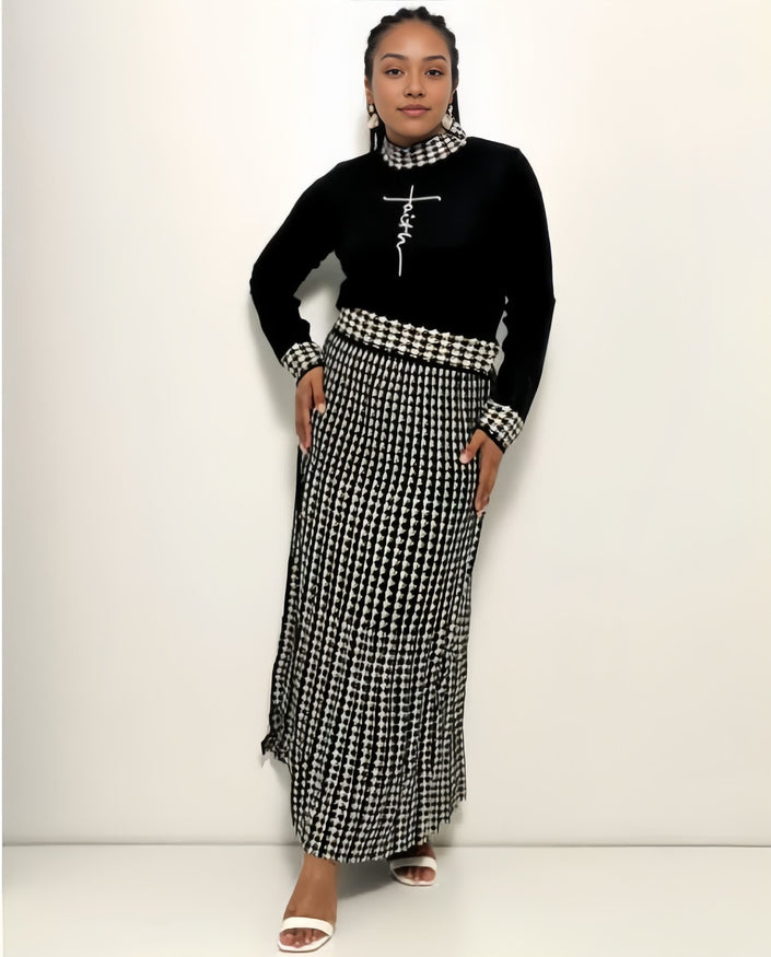 Black sweater top and houndstooth knit maxi skirt with plaid pattern