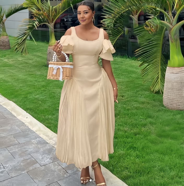 Off-shoulder maxi dress in peach with pleated skirt and short ruffle sleeves