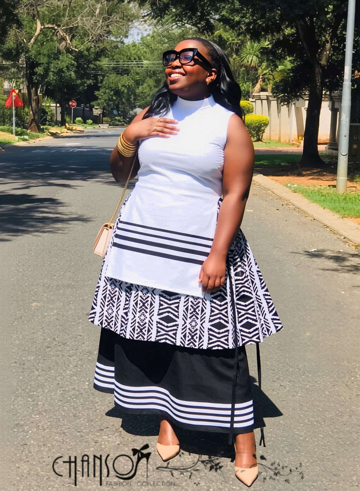 Two-piece sleeveless mock-neck ethnic dress: white and navy geometric striped layers