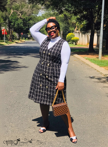 Plaid double-breasted midi dress in dark tones, sleeveless with gold buttons