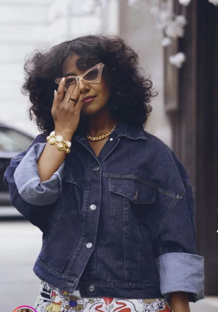 Oversized dark blue denim jacket with chest flap pocket, button-front, long sleeves