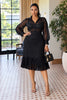 Black two-piece set with sheer button blouse and fitted midi skirt with pleated hem