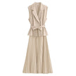 Beige belted sleeveless blazer and pleated midi skirt set, peplum detail