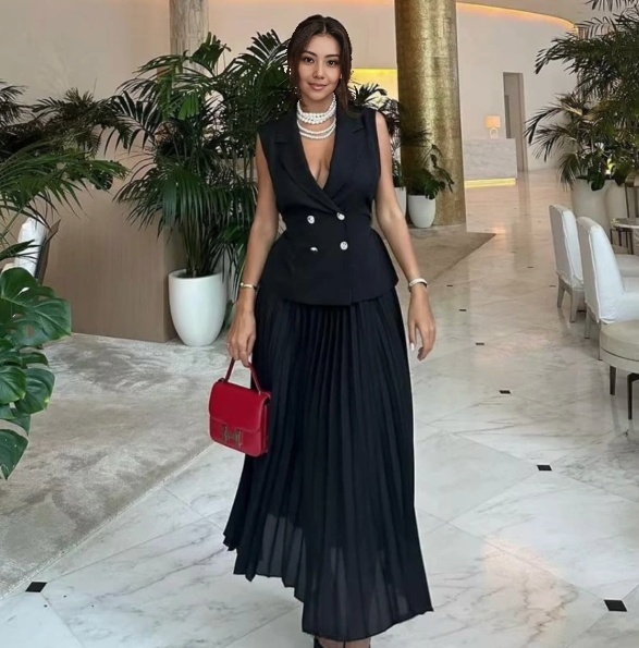 Black belted sleeveless peplum blazer and pleated midi skirt set
