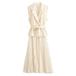 Cream belted sleeveless blazer and pleated midi skirt set with peplum
