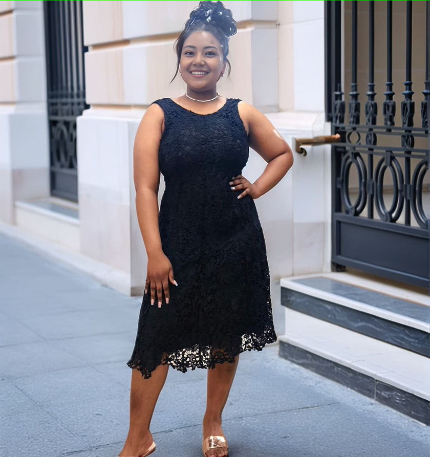 Black lace sleeveless evening dress, knee-length with scalloped hem