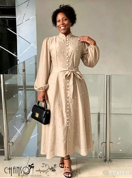 Beige midi dress with stand collar, dot beaded detailing, balloon sleeves, self-tie waist