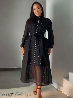 Black stand-collar midi dress with dot-bead detailing, self-tie waist, balloon sleeves