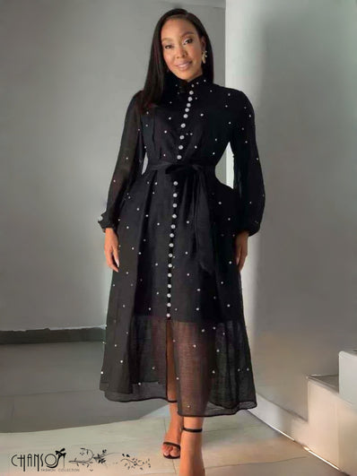 Black stand-collar midi dress with dot-bead detailing, self-tie waist, balloon sleeves