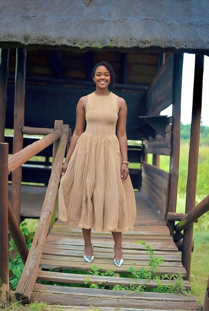 Beige ribbed knit midi dress, sleeveless with round neckline and gathered skirt