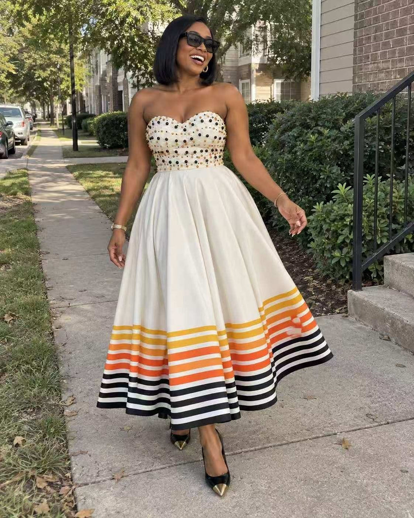 Women's strapless beaded cream midi dress with striped hem