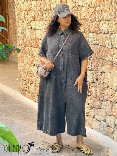 Loose-fit dark denim jumpsuit, collared short sleeves, front pockets