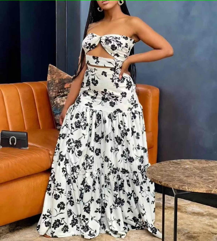 Floral print maxi skirt with tiered ruffle hem, white base with black flowers