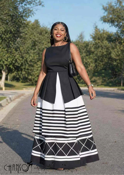 Ethnic maxi dress, sleeveless black bodice with striped geometric tiered skirt