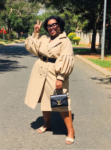 Beige puff-sleeve double-breasted trench coat with belt and buttoned placket
