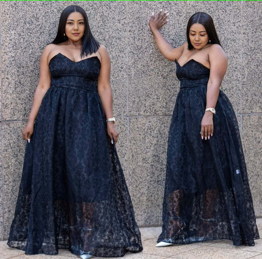Strapless lace maxi dress with dark blue floral pattern, fitted bodice and full skirt