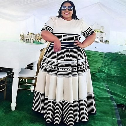 Women’s midi dress with geometric stripe skirt, short sleeves, fitted waist, black and cream