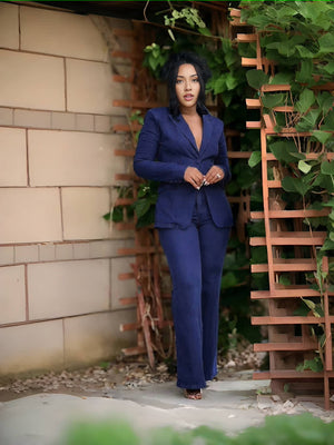 Blue denim blazer and wide-leg trousers set, single-breasted front, tailored fit.