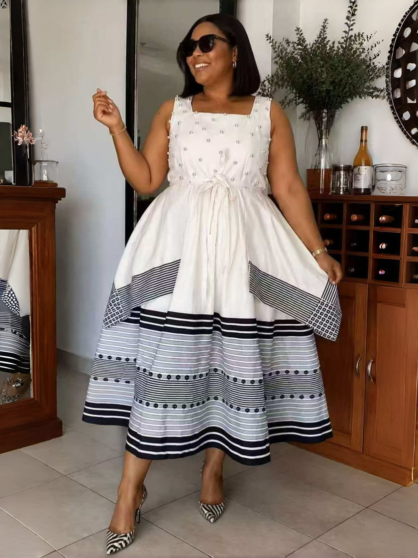 Women's white sleeveless midi dress with pearl detail and striped hem