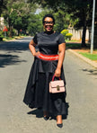 Black short-sleeve asymmetric maxi dress with a red contrast waist band