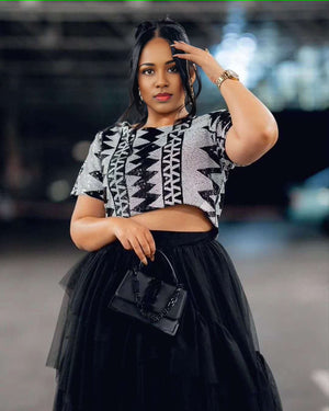 Two-piece crop top and tulle midi dress with geometric black/white crop top and black tulle skirt