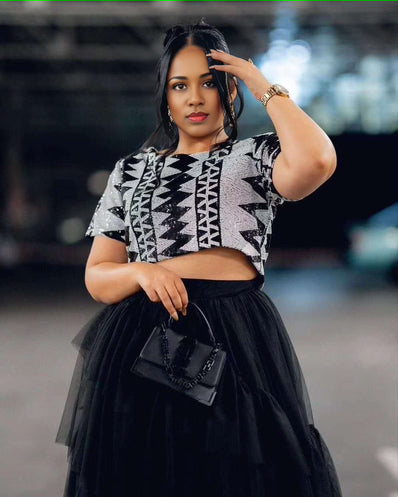 Two-piece crop top and tulle midi dress with geometric black/white crop top and black tulle skirt