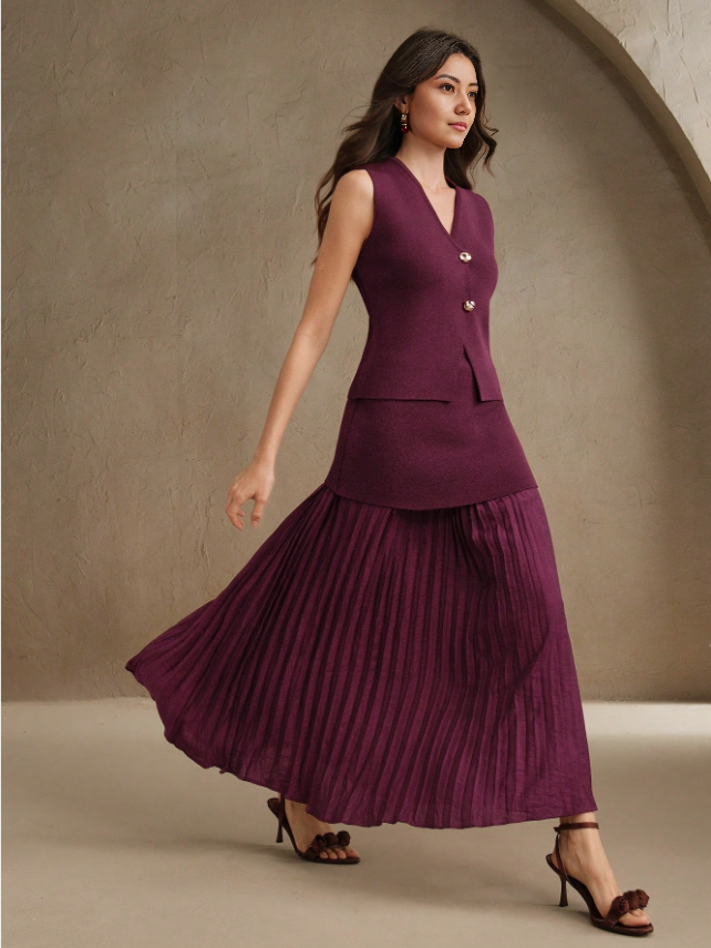 Maroon sleeveless vest with gold buttons and pleated midi skirt, matching set