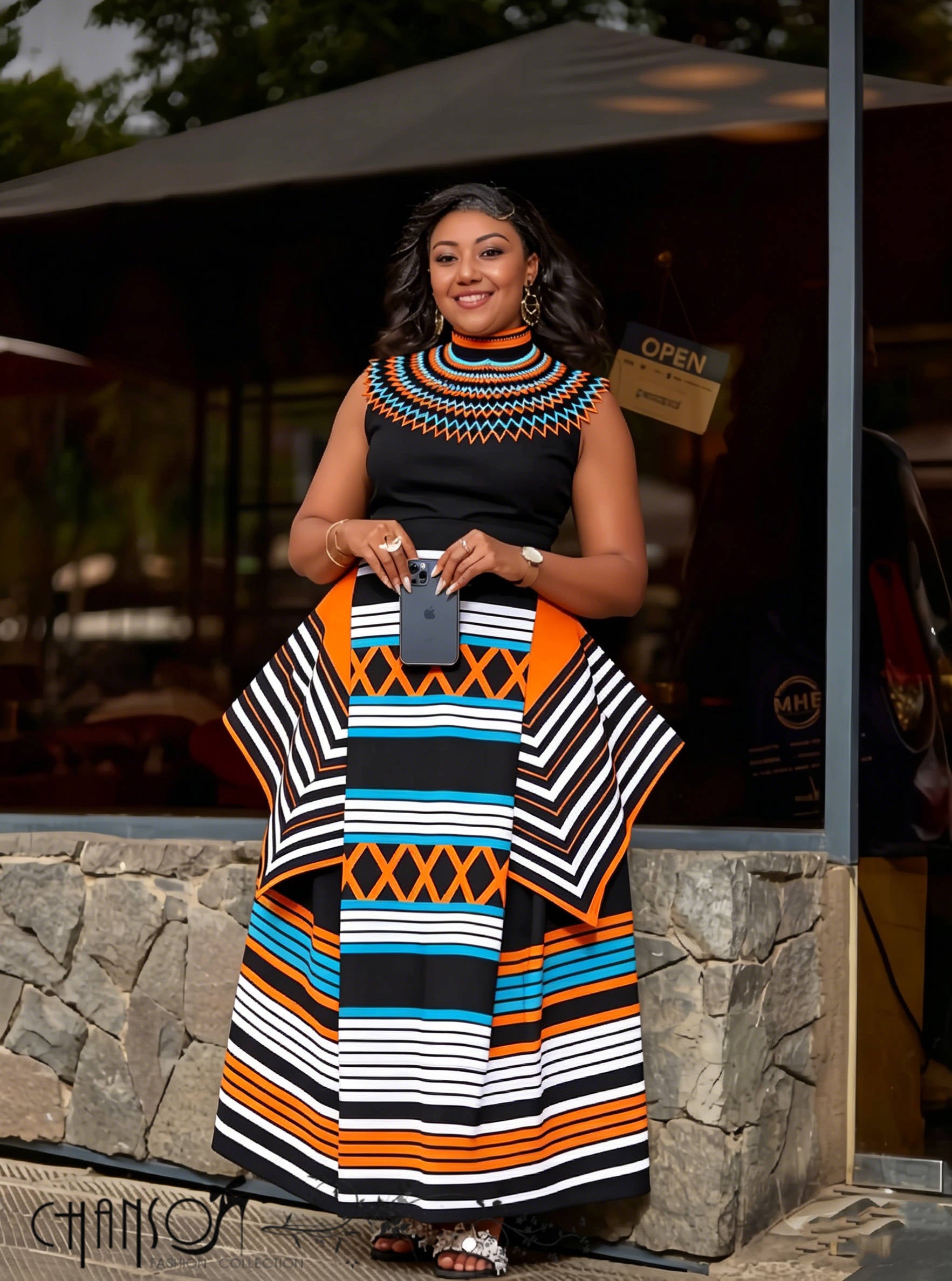 Geometric print sleeveless maxi dress with orange, blue, black and white stripes