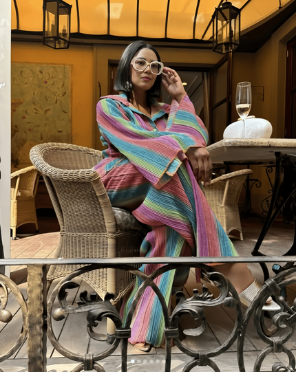 Rainbow stripe hooded loose-fit top with V-neck and relaxed long sleeves