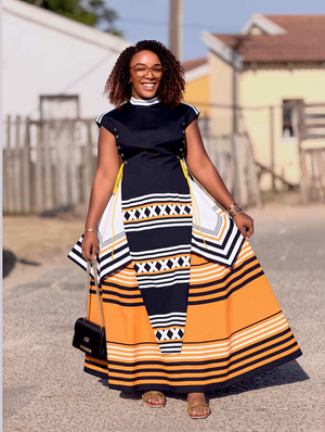 Women’s maxi dress set with black short-sleeve bodice and orange patterned tiered skirt