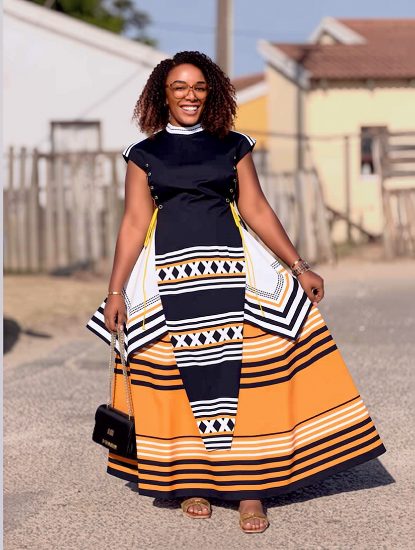 Women’s maxi dress set with black short-sleeve bodice and orange patterned tiered skirt