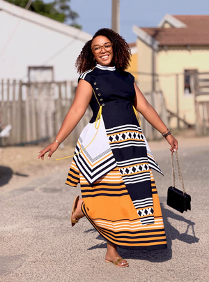 Women’s long dress set with black bodice, cap sleeves, and orange striped graphic skirt