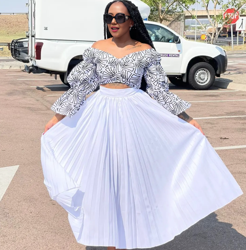 Pleated maxi skirt with white off-shoulder patterned cropped top set