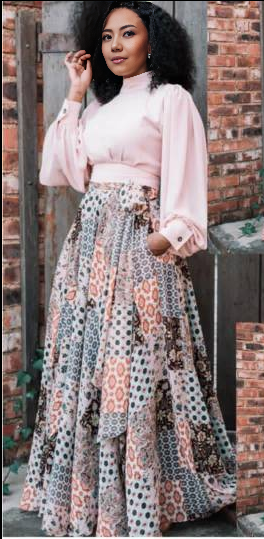 Pink puff-sleeve maxi dress with patterned floral geometric skirt