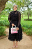 Women's black sheer tiered midi set with ruffled skirt and long-sleeve top.