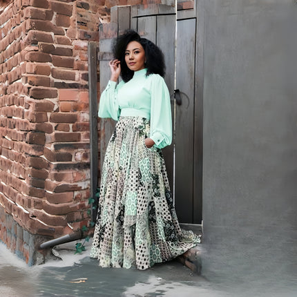 Mint green puff-sleeve maxi dress with geometric floral tiered skirt