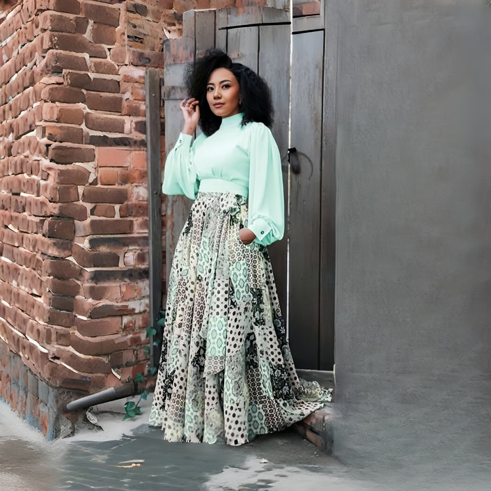 Mint green puff-sleeve maxi dress with geometric floral tiered skirt