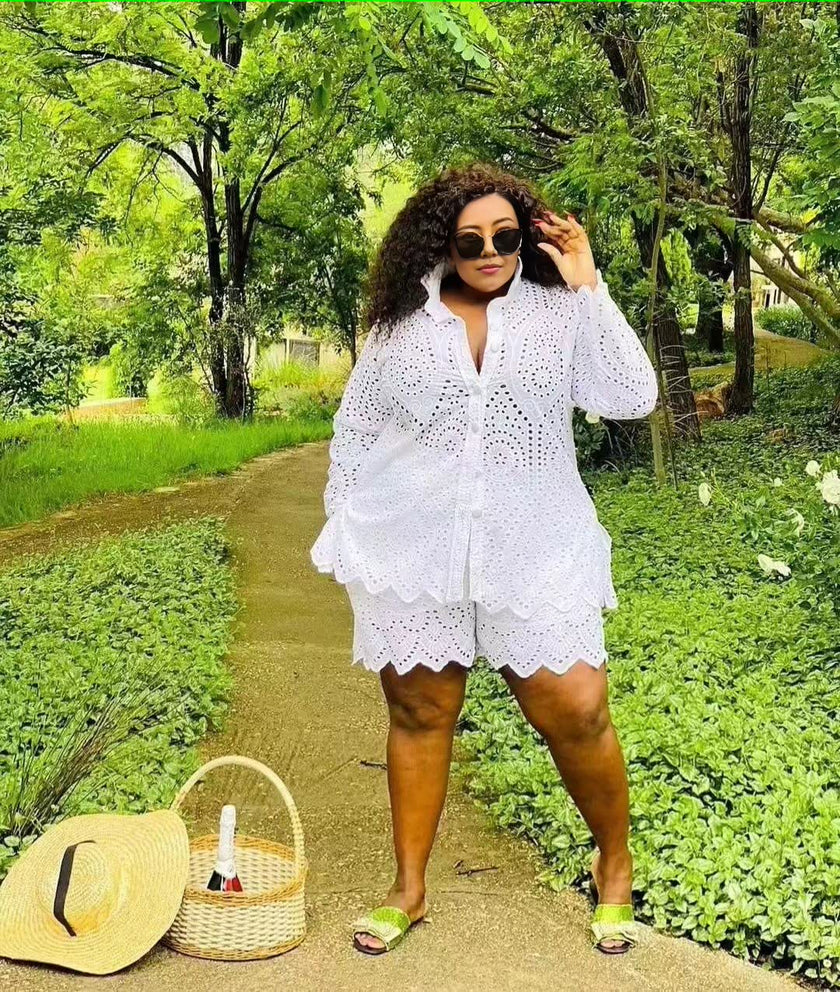 White eyelet twin set with long sleeves and scalloped hem