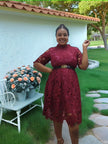 Maroon lace evening dress with puff sleeves and belted waist, flared short skirt