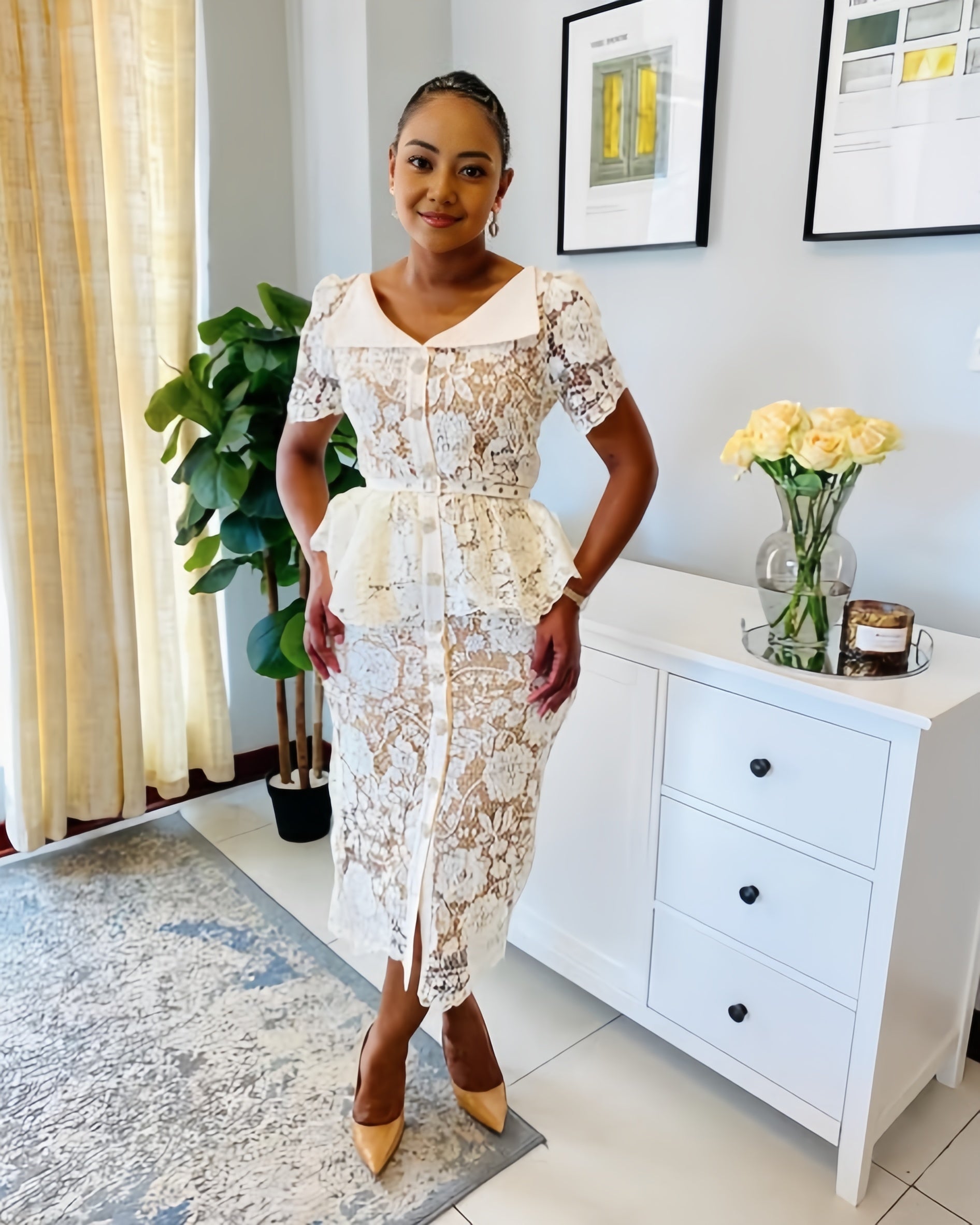 White lace midi dress with V-neck, short sleeves, and belted floral pattern