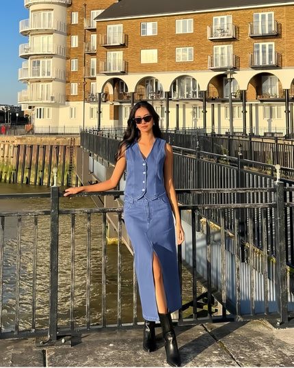 Light-blue denim sleeveless mandarin-collar vest and matching long skirt, button front