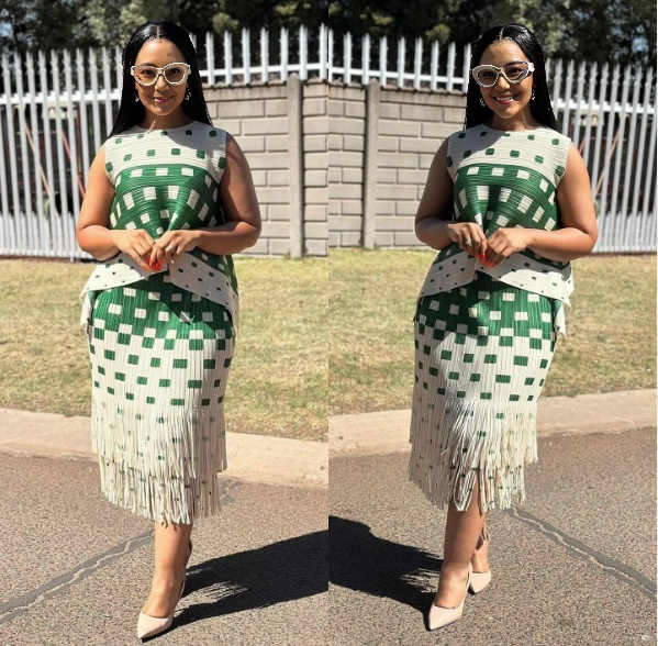 Green geometric fringe skirt with white square pattern and layered hem fringe